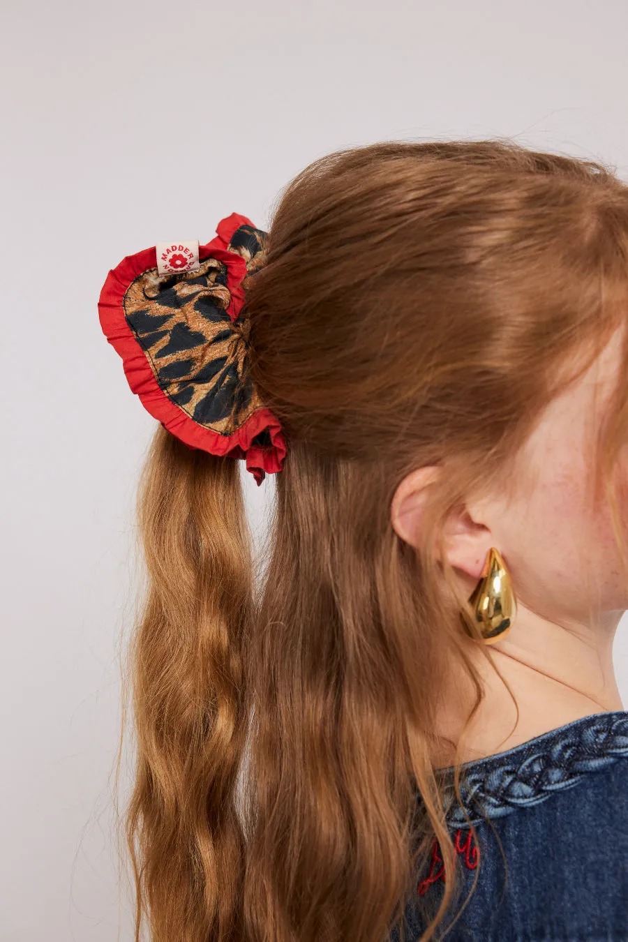frill scrunchie in leopard with red edge